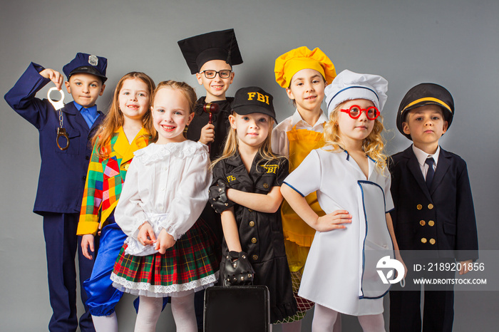 Group of school children dressing up as professions. Future education.