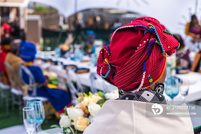 Rear view of Xhosa woman during event