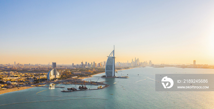 Aerial view of Burj Al Arab Jumeirah Island or boat building, Dubai Downtown skyline, United Arab Em