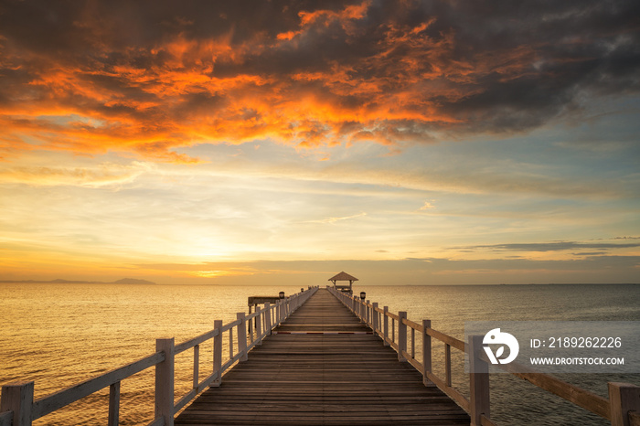 Wooded bridge with sunset