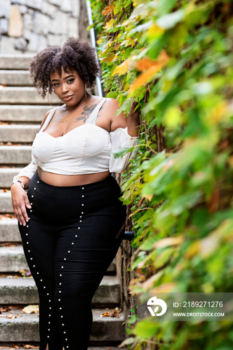 Plus size fashion forward Black woman outside