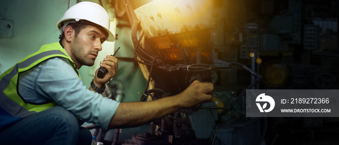 The industrial mechanic technician is repairing the machine.