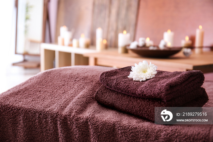 Clean towels on table in spa salon