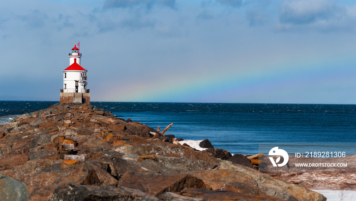 The Wisconsin Point Light is a lighthouse located near Superior on Wisconsin Point Rainbow in the ba