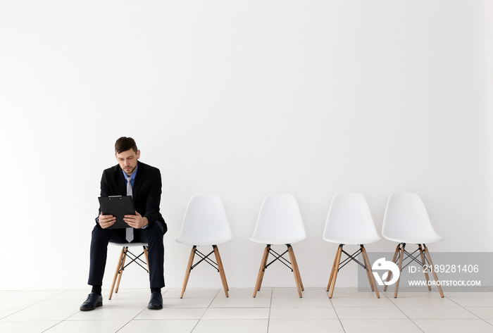 Young man waiting for job interview