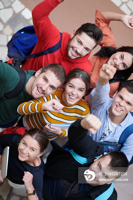 group of happy young people showing their unity.