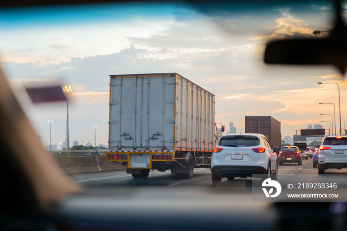 Car and trucks in Traffic jam on highway in rush hour.