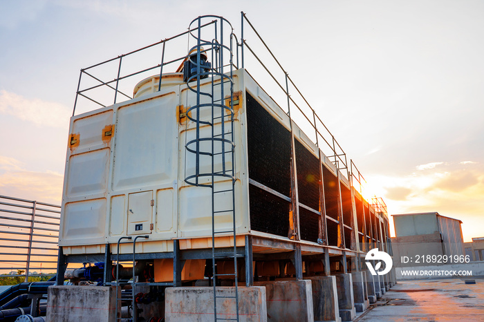 Cooling tower set in a large building Data center is installed on the roof - image