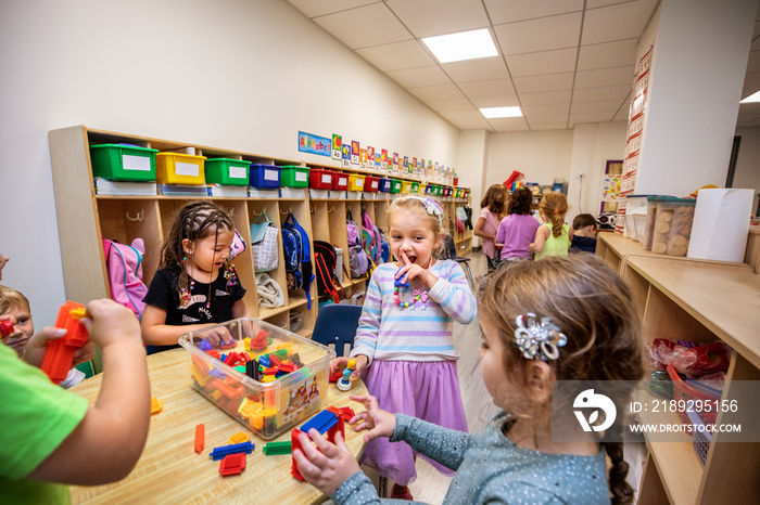 Children playing with puzzle pieces