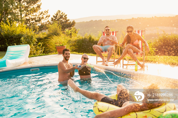 Friends having fun at a poolside party