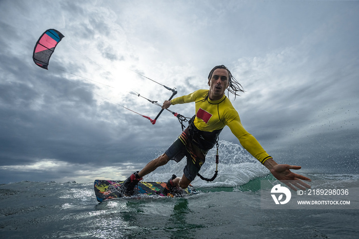 Kite surfer on the waves