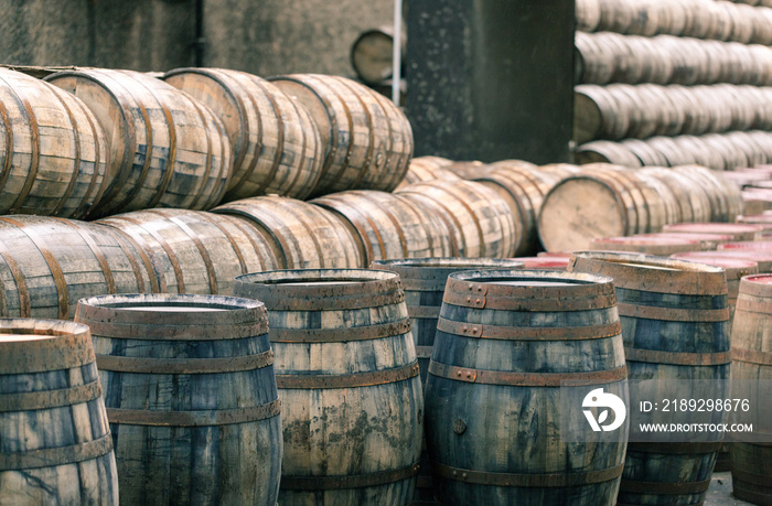 Whisky barrels full of whiskey in Scottish traditional distiller