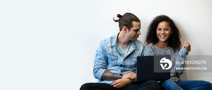 Young Couple using Laptop computer