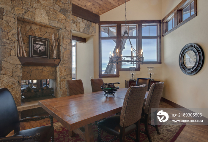 Dining table by stone wall in middle class house