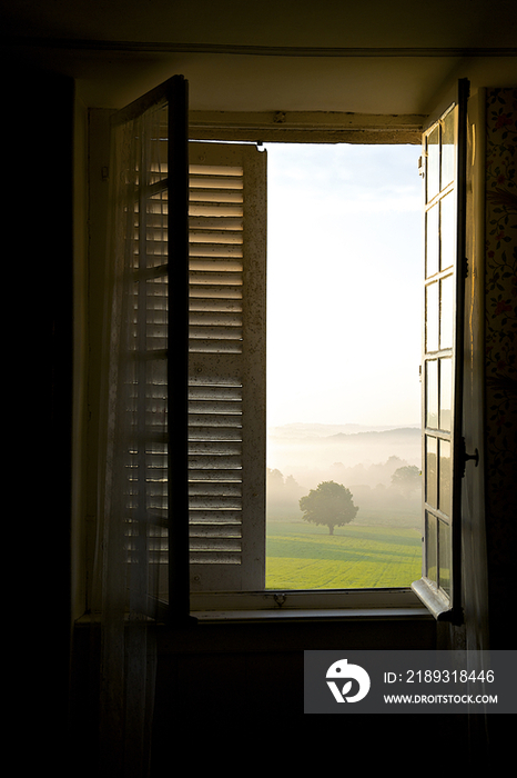 Countryside through window