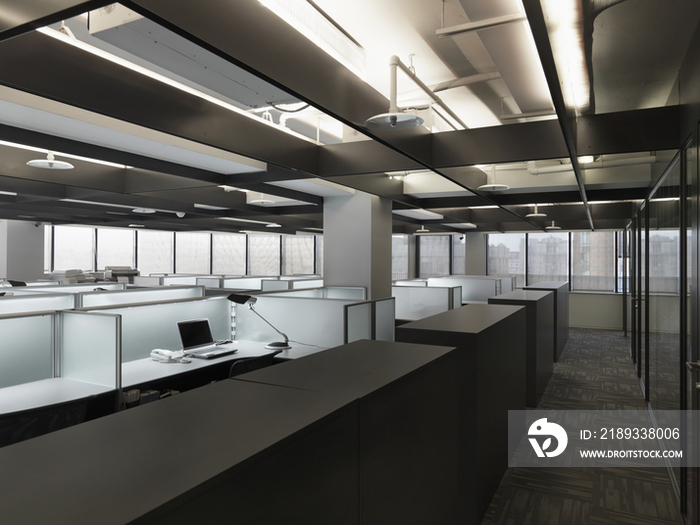 Interior of a contemporary office space with cubicles