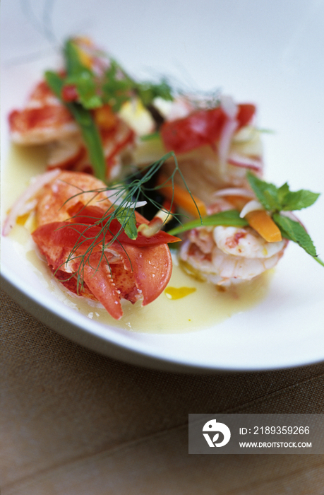 Boiled crustaceans in spiced water