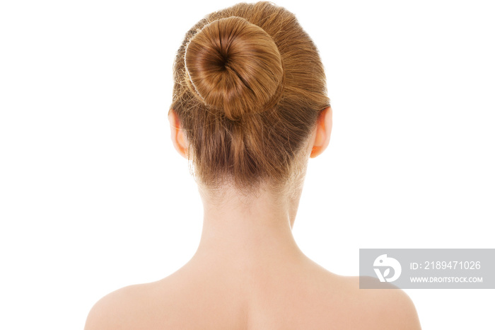 Naked woman back- head and shoulders.