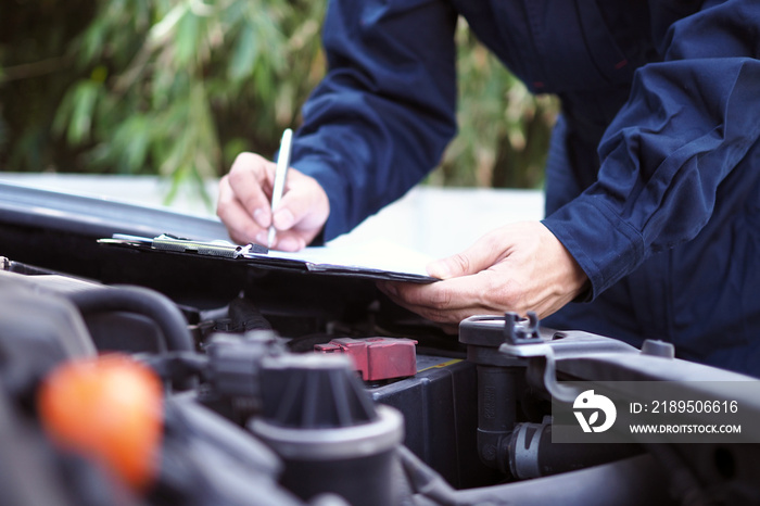 The engine engineer is checking and repairing the car. Off-site care services