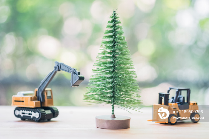 Excavator and forklift toy model move Christmas tree