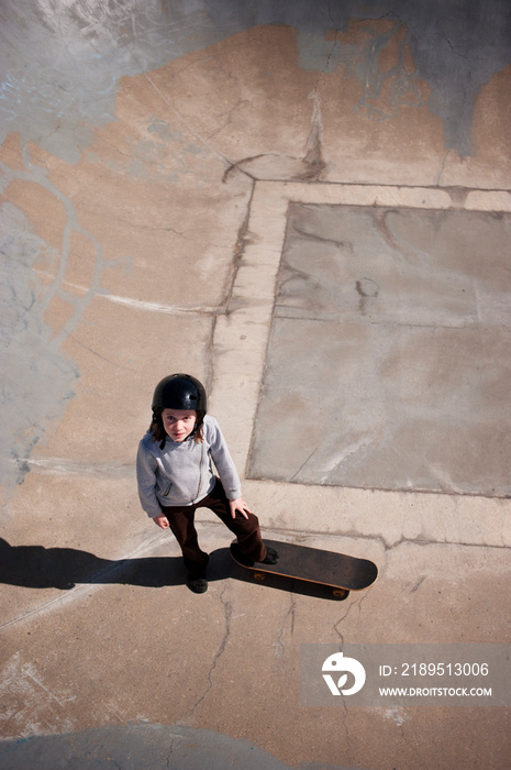 Girl (8-9) on skateboard