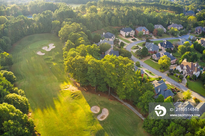 Beautiful aerial view of a sub division with golf course and a beautiful lake  in suburbs of Atlanta