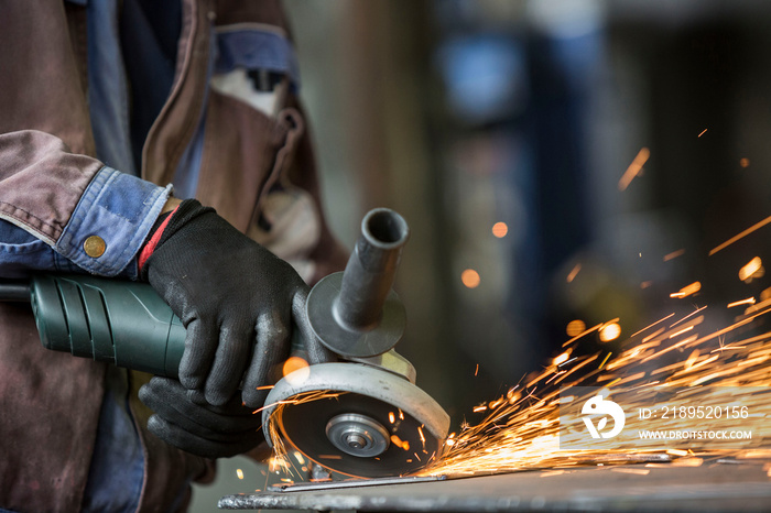 Grinding of materials in metallurgy workshop