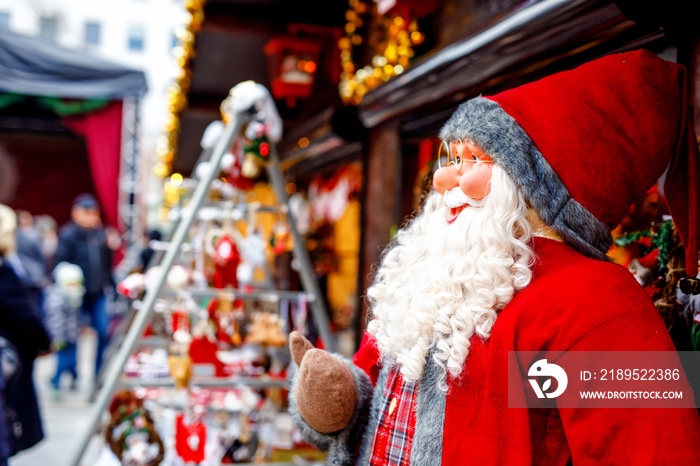 christmas market in Germany cute Santa Clause called Weihnachtsmann in German decoration, gifts, Xma