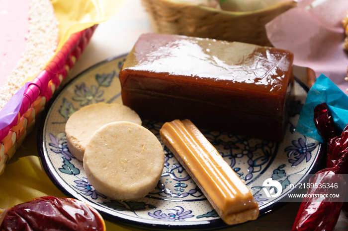 Group of mexican candies on wooden background