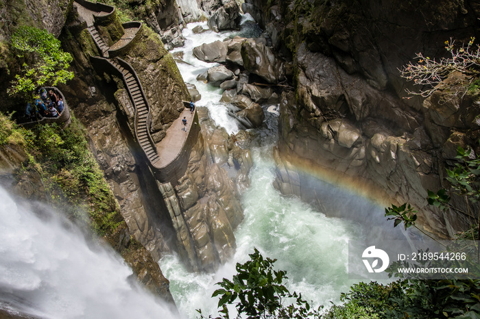 A wonderful rainbow in the canyon of the waterfalls called  pailon del diablo  near Baños de Agua Sa