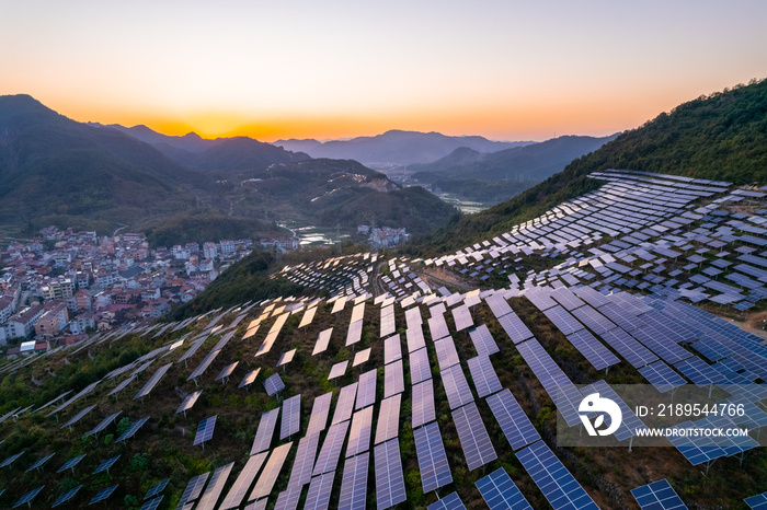 aerial view of solar power panels on hill