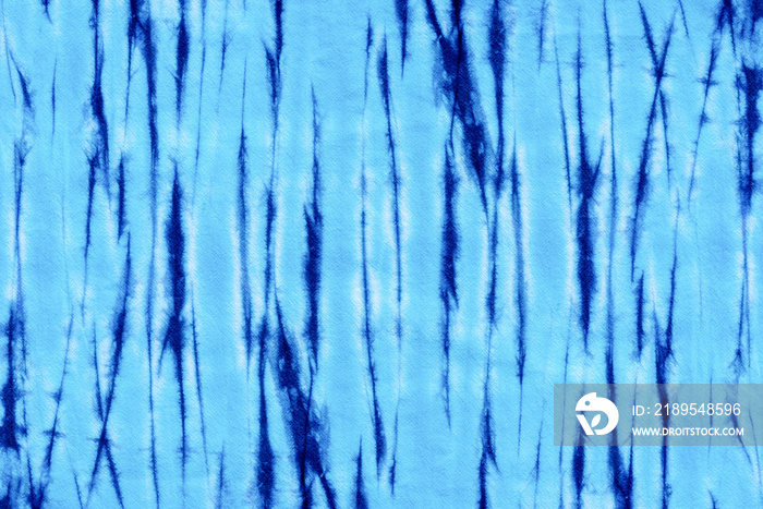 blue tie dye pattern hand dyed on cotton fabric abstract texture background.