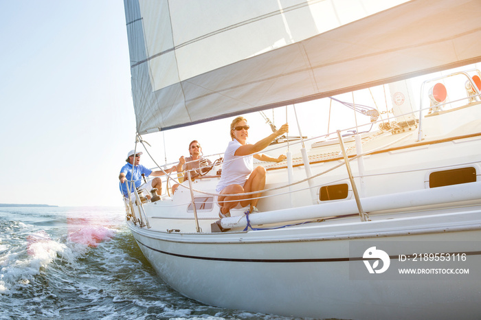 Friends relaxing on private yacht