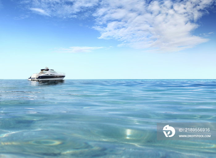 a luxury private motor yacht on tropical sea surface with blue sky clouds sunshine, empty background