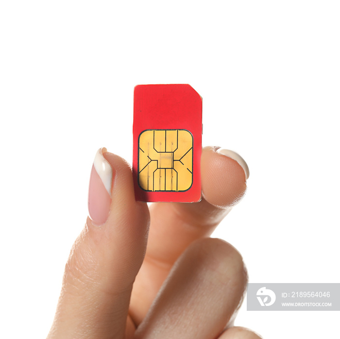 Female hand holding sim card on white background