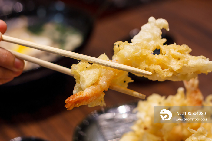 Tempura Fried shrimp in chopsticks