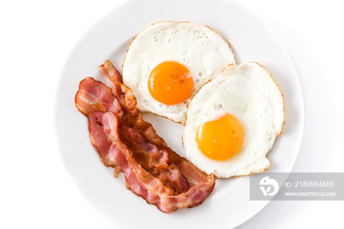 Fried eggs and bacon for breakfast isolated on white background.Top view. Close up