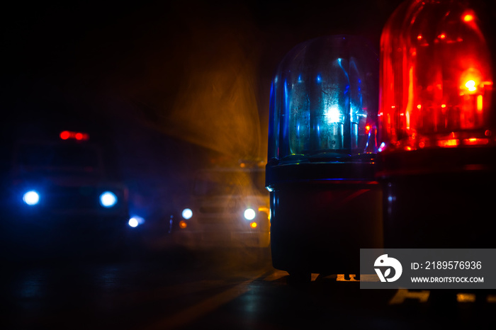 Police car blue and red round vintage siren in dark. Rotating retro style police siren in dark.