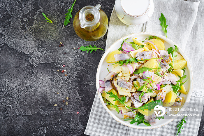 Traditional  salad of salted herring fillet, fresh apples,  red onion  and potatoes. Kosher food. Sc