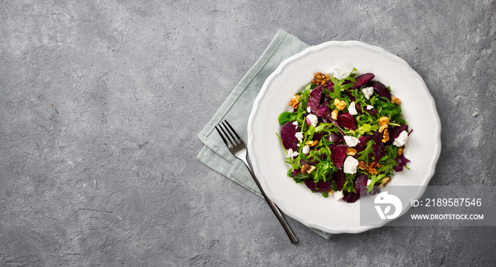 Salad plate on a dark background top view