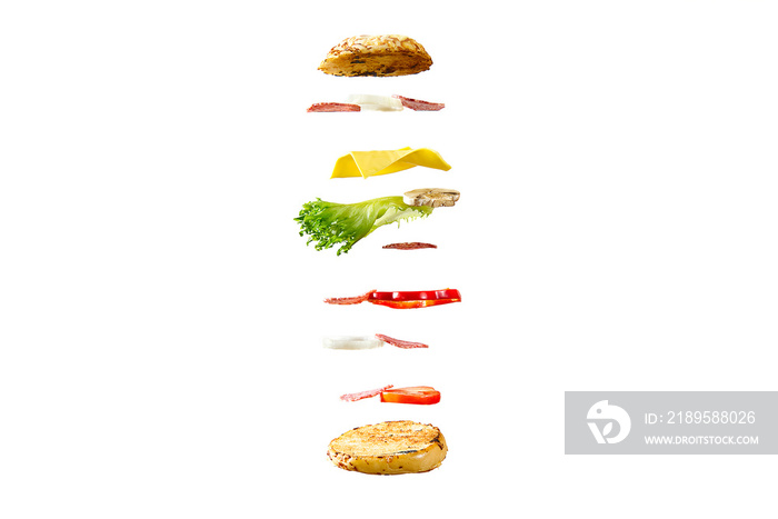 飞行三明治。飞行的三明治。烤得很好的肉饼、火腿、奶酪和介于t之间的蔬菜