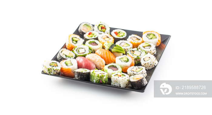 Assortment of japanese sushi rolls nigiri sashimi and maki isolated on white