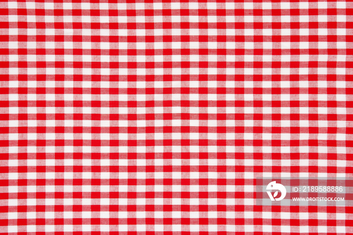 Red gingham fabric pattern background.