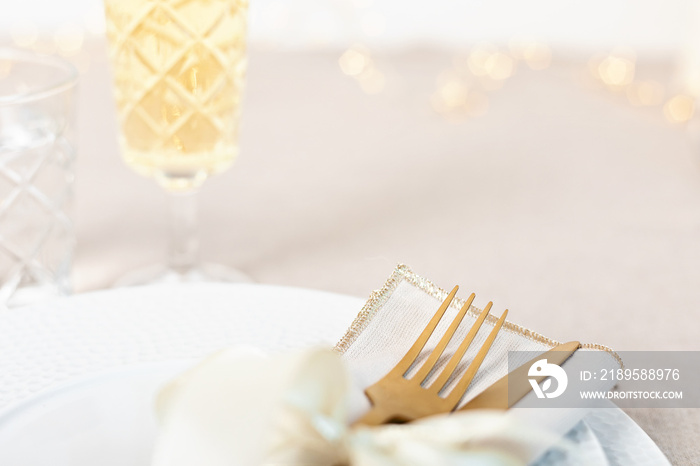 Festive christmas, wedding, birthday table setting with golden cutlery. Mockup for place card, dinne