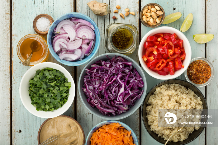 Ingredients for cooking Thai quinoa salad with ginger peanut butter dressing.