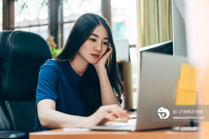 Young adult business freelancer asian woman working at home office.