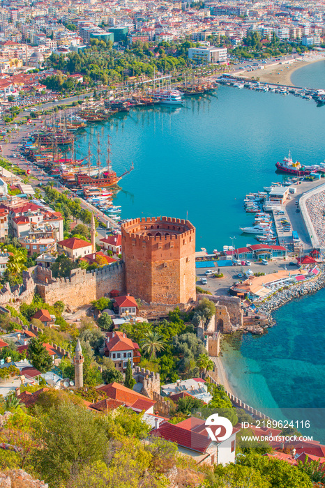 Landscape with marina and Kizil Kule tower in Alanya peninsula, Antalya district, Turkey