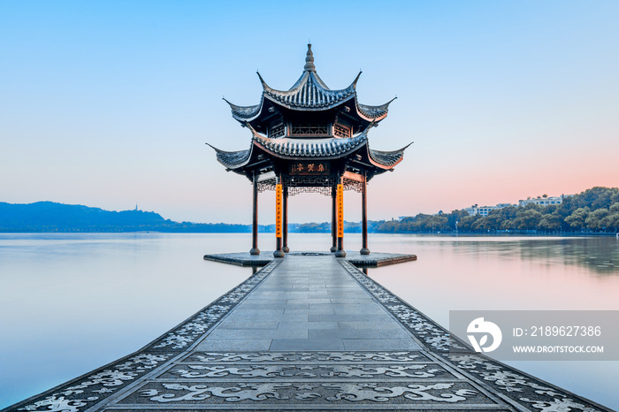 Jixian pavilion during sunrise in hangzhou，Zhejiang province，China.