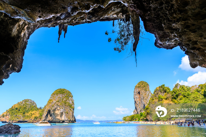 Majestic cave and limestone cliff mountain at Phra Nang Beach, famous tourists destination; Krabi, T