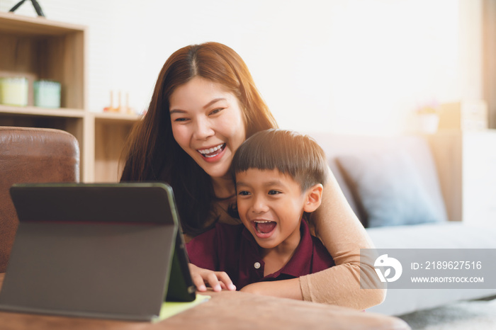 image of happy family at living room,happiness time of family playing at home,Mom and baby are happi